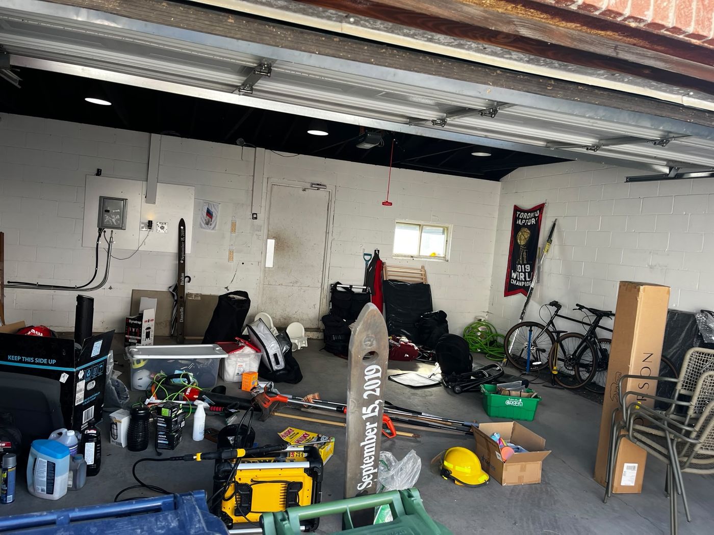 Cluttered Toronto garage before cleaning